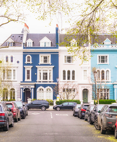 Cars parked on a residential street in Notting Hill, West London.