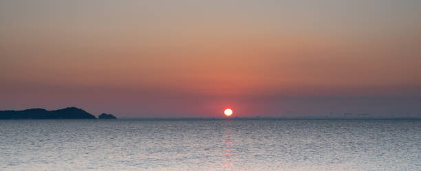 istock sunrise by the sea 1904225886