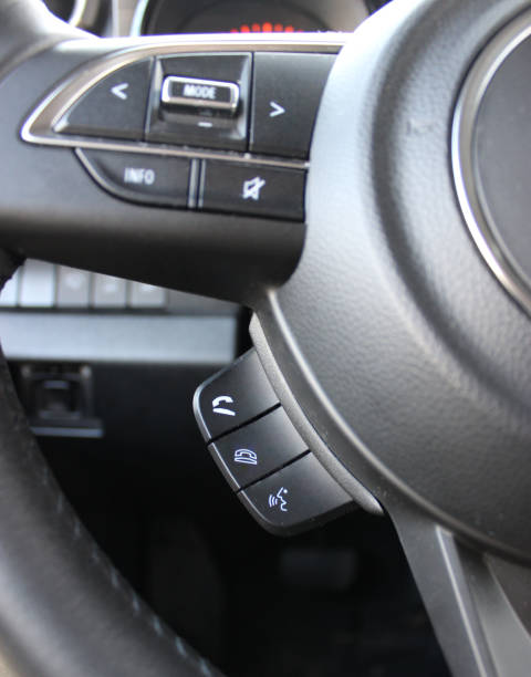 istock Hands Free Phone Buttons Under Steering Wheel In Car Closeup View 1904227438