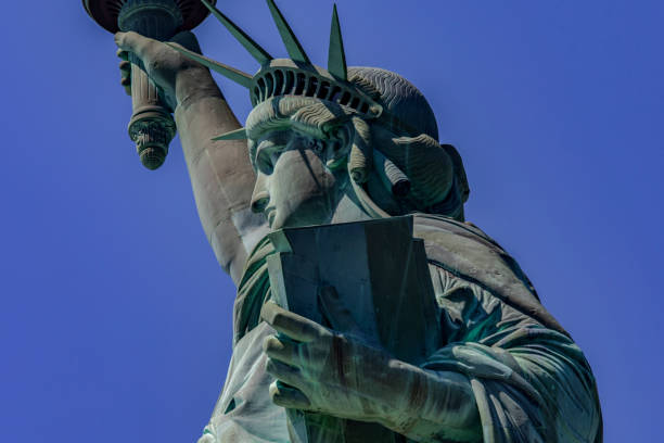 istock The Statue of Liberty with her crown holding her torch. 1904247468