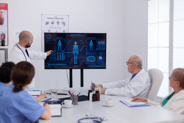 istock Physician man presenting brain radiography analyzing medical expertise 1904259223