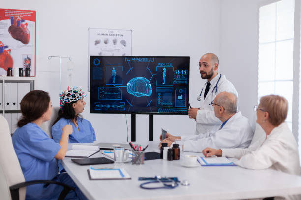 istock Hospital medical team doing brain activity research using headset with sensors 1904266831