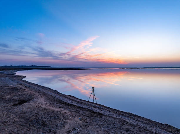 istock sunset over the sea,tent on the beach at sunset 1904338123