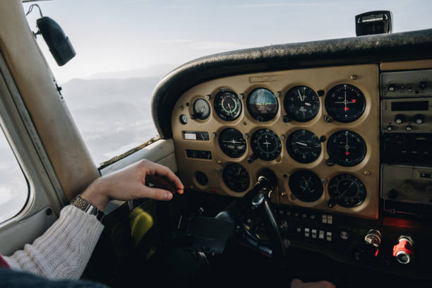 view from small aircraft over the cloudy hills - ground crew audio imagens e fotografias de stock