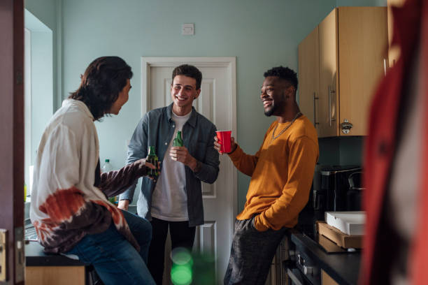 istock Relaxing with Friends in the Kitchen 1904475458