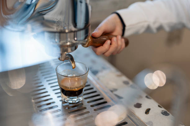 istock Female barista preparing coffee 1904500010