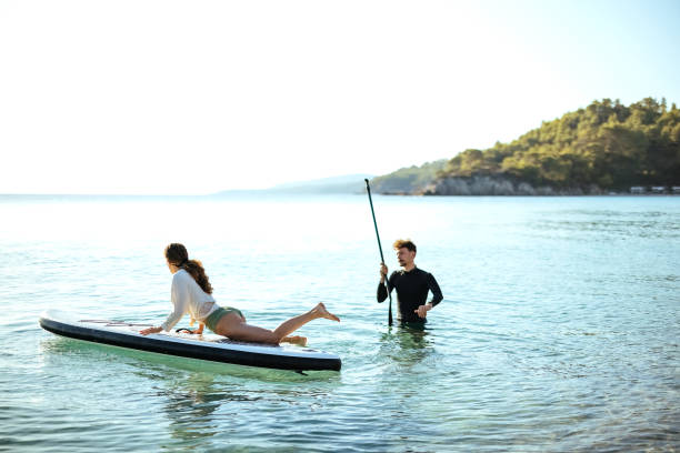 istock I will be your teacher to learn to paddle board 1904521364
