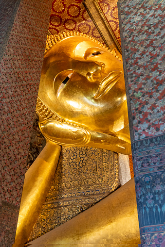 The giant Reclining Buddha at Wat Pho, Bangkok, Thailand