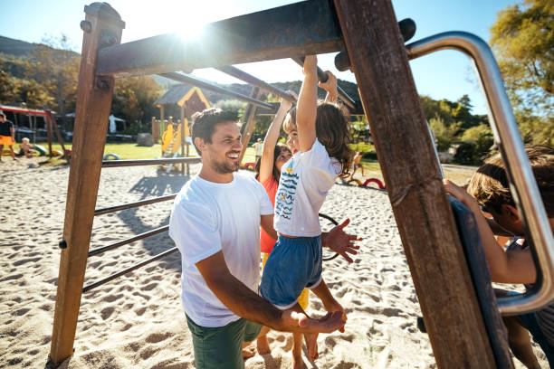 istock Children have fun on the playground 1904586832