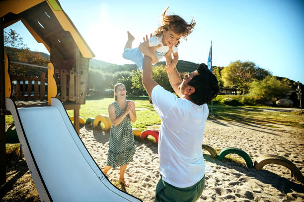 istock Precious moments with dad and mom on the beach 1904590590