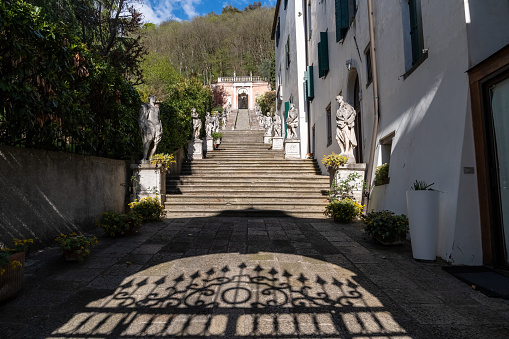 Monselice, Italy-April 16, 2023:View of the staircase of the historic villa on the sanctuary road in Monselice during a sunny day