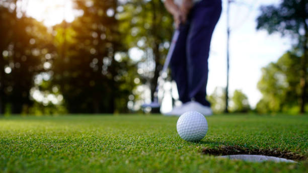 istock golfer playing golf in beautiful golf course in the evening golf course with sunshine 1904674813