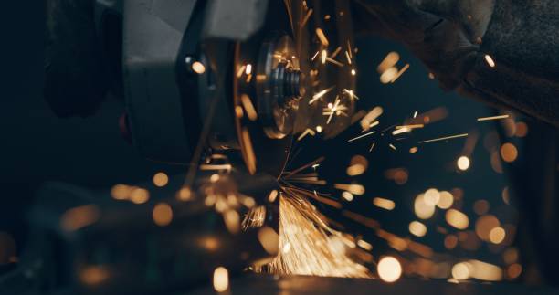 istock Grinding Metal Sparks Steel Cutting At Industrial Workshop 1904676371