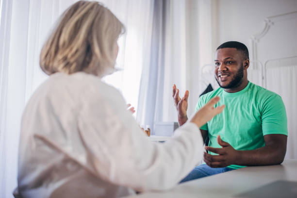 istock Doctor and a patient talking in the doctor's office 1904689024