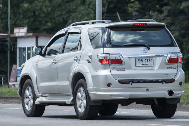 Chiangmai, Thailand -  September 8 2023: Private  Toyota Fortuner Suv Car. On road no.1001 8 km from Chiangmai city.