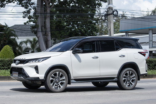 Chiangmai, Thailand -  September 8 2023: Private  Toyota Fortuner Suv Car. On road no.1001 8 km from Chiangmai city.