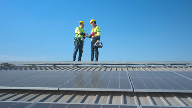 istock Both of technician working on a photovoltaic solar panels 1904730791