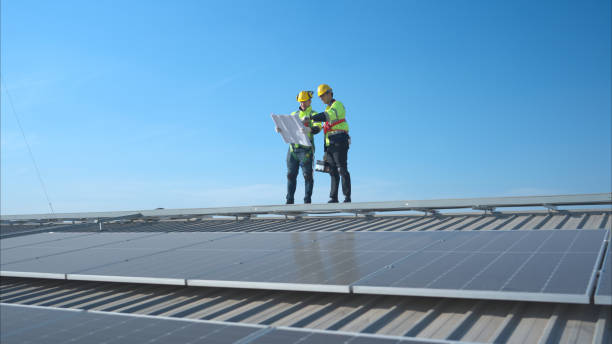 istock Both of technician working on a photovoltaic solar panels 1904731838