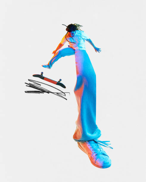 istock Contemporary art collage. Young guy, skateboarder with long legs training tricks in jump with skateboard. Trendy magazine style. Championship 2024. 1904733513