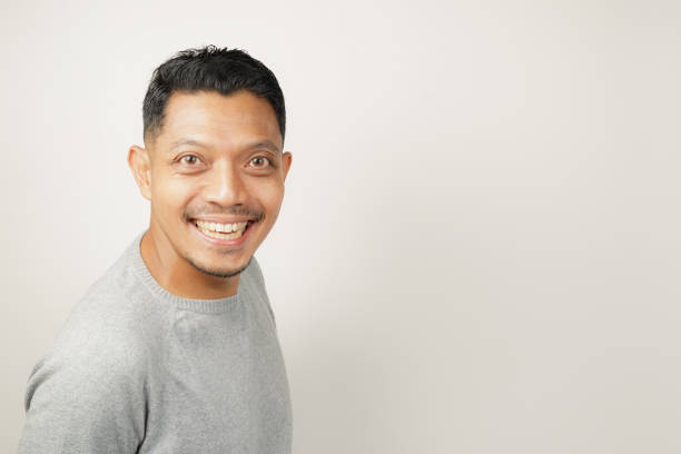 Asian man expression with happy laughing face, isolated background