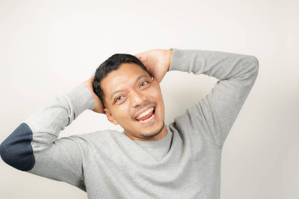 istock Asian man expression with happy laughing face, isolated background 1904808055