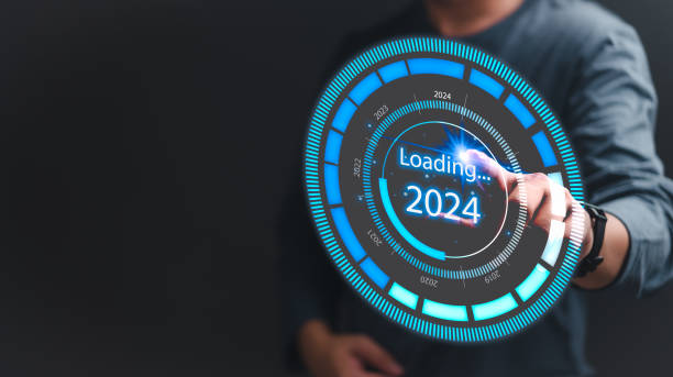 istock Hand touching loading 2024. Business startup strategy growth and target success data investment finance concept. 1904809338