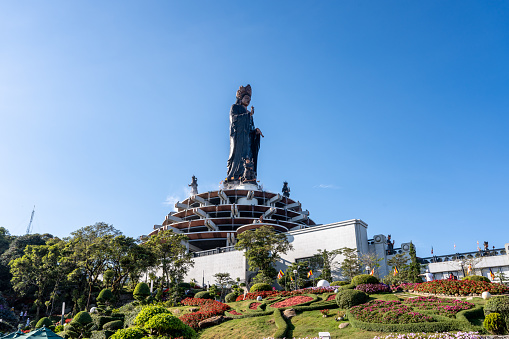 View of Ba Den mountain tourist area, Tay Ninh province, Vietnam. A unique Buddhist architecture with the highest elevation in the area view from below is very beautiful. Travel and landscape concept.