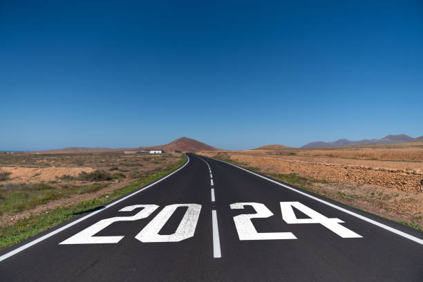 istock 2024 Start new year - Start 2024 written on road 1904900391