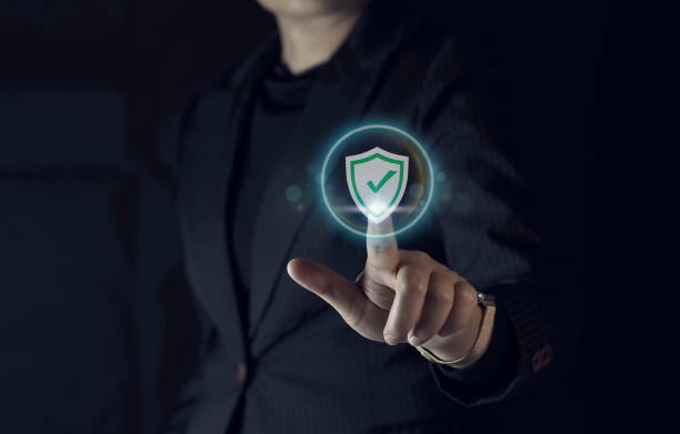 istock Businessman hand touching glowing correct sign mark with copy space area for document approval and project approve concept. 1904909286
