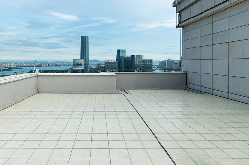 Empty rooftop in seaside city.