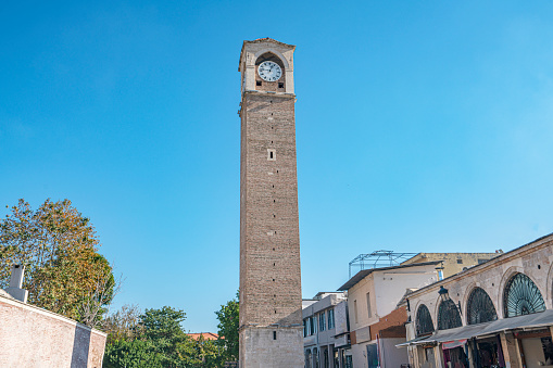 Adana, Turkey-December 29, 2023: People visiting the Clock Tower and the bazaar in the  old city of Adana, Turkey