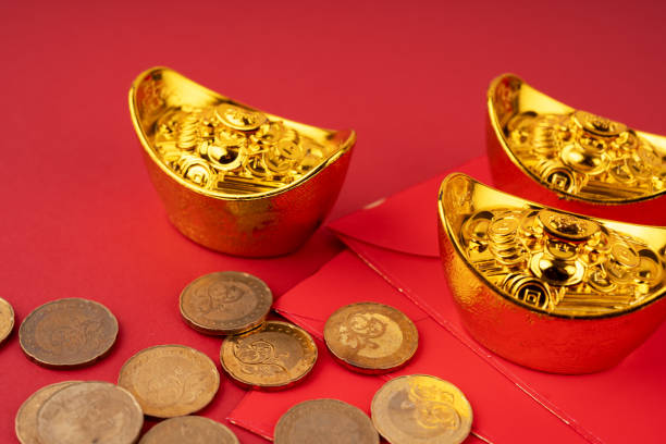 istock Red envelope, gold ingot and coins 1904939039