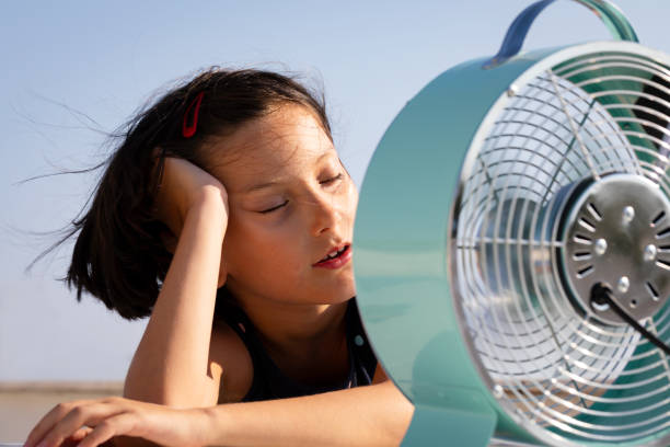 istock Little child during summer heat looking for refreshment 1904958420