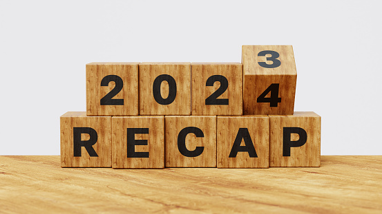 2023 Recap economy, business, financial summary, business review concept. Business plan for 2025. Wooden cube flips from 2023 Recap to 2024 Recap. 3d illustration