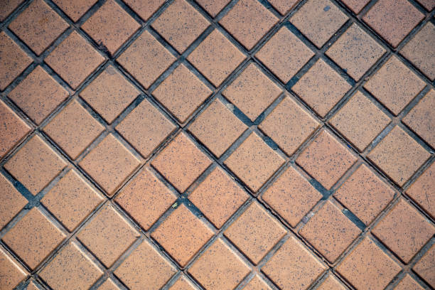 Floor square block tiles and terrazzo cross lines background. High quality photo