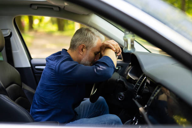 istock Mid age man sitting inside car is very upset and stressed 1905012376