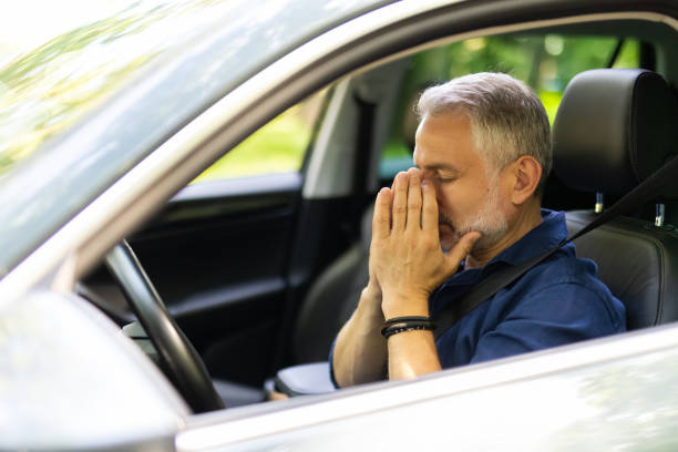 istock Feeling Anxiety. Exhausted, overloaded mid age man closing eyes with hand, experiencing headache or stress 1905014936