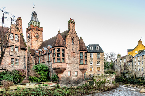 Historic buildings in Dean Village in Edinburgh with the Water of Leith river