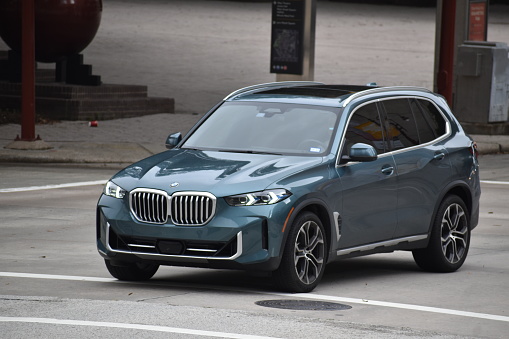 Houston, TX USA 10-4-2023 - A new BMW X7 cruising in the downtown district of Houston.