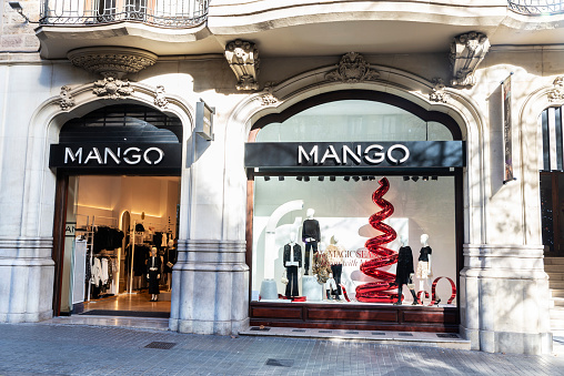 Barcelona, Spain - November 30, 2023: Display of a Mango clothing store in Rambla de Catalunya, a shopping street of Barcelona, Catalonia, Spain