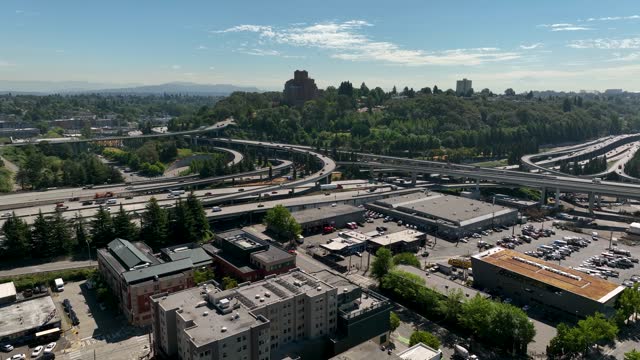Drone shot over Seattle's International District with the main freeways in the distance.