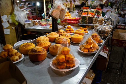 Sweets and pastries for sale. The Central Market is a market and an art deco landmark and busy location for buying and selling goods in Phnom Penh, Cambodia