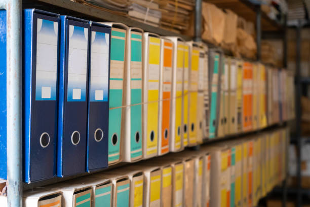 istock Old filing cabinet with dusty, colorful files. 1905204941