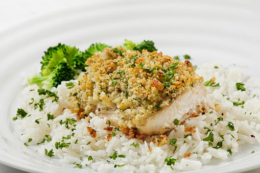 Crispy Baked Parmesan Baked Halibut Fillet with White Rice and Steamed Broccoli