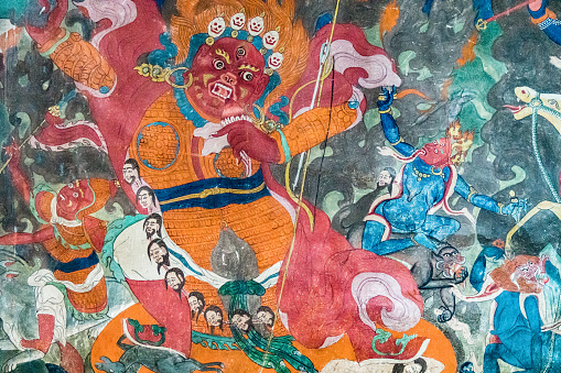 Bangkok, Thailand, December 27, 2018. A Bangkok temple features a traditional Thai mural that recounts mythical narratives from the Ramayana.