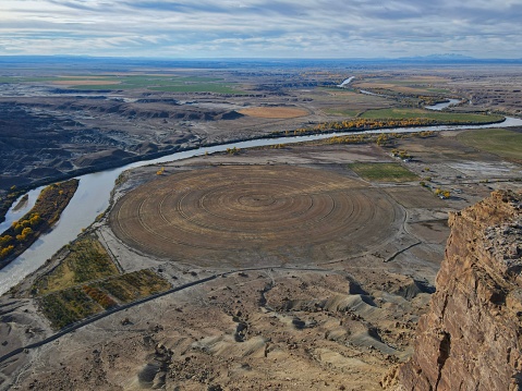 Drone image of a crop circle and the Green River in Green River, Utah