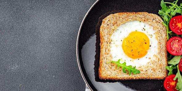 fried egg bread toast scrambled yolk protein delicious breakfast hearty food fresh delicious healthy eating cooking appetizer meal food snack on the table copy space food background rustic top view