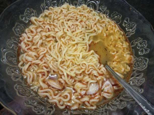 istock Simple menu at home, a plate of instant noodles 1905297304