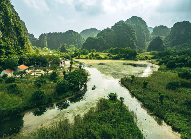istock Top view over Tam Coc with karst formations, Ninh Binh province, Vietnam 1905314799