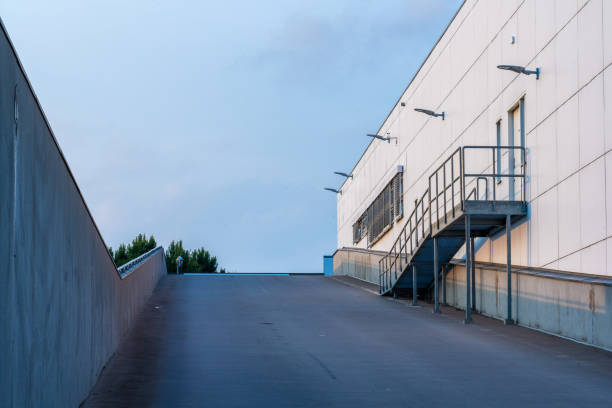 istock Car ramp leading up to a parking deck.. 1905349400